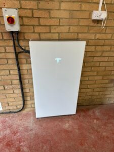 Tesla Powerwall 3 mounted on inside garage wall in Milton Keynes Home